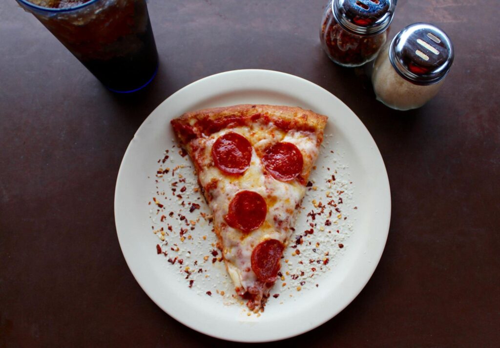 Slice of Pizza on a Plate