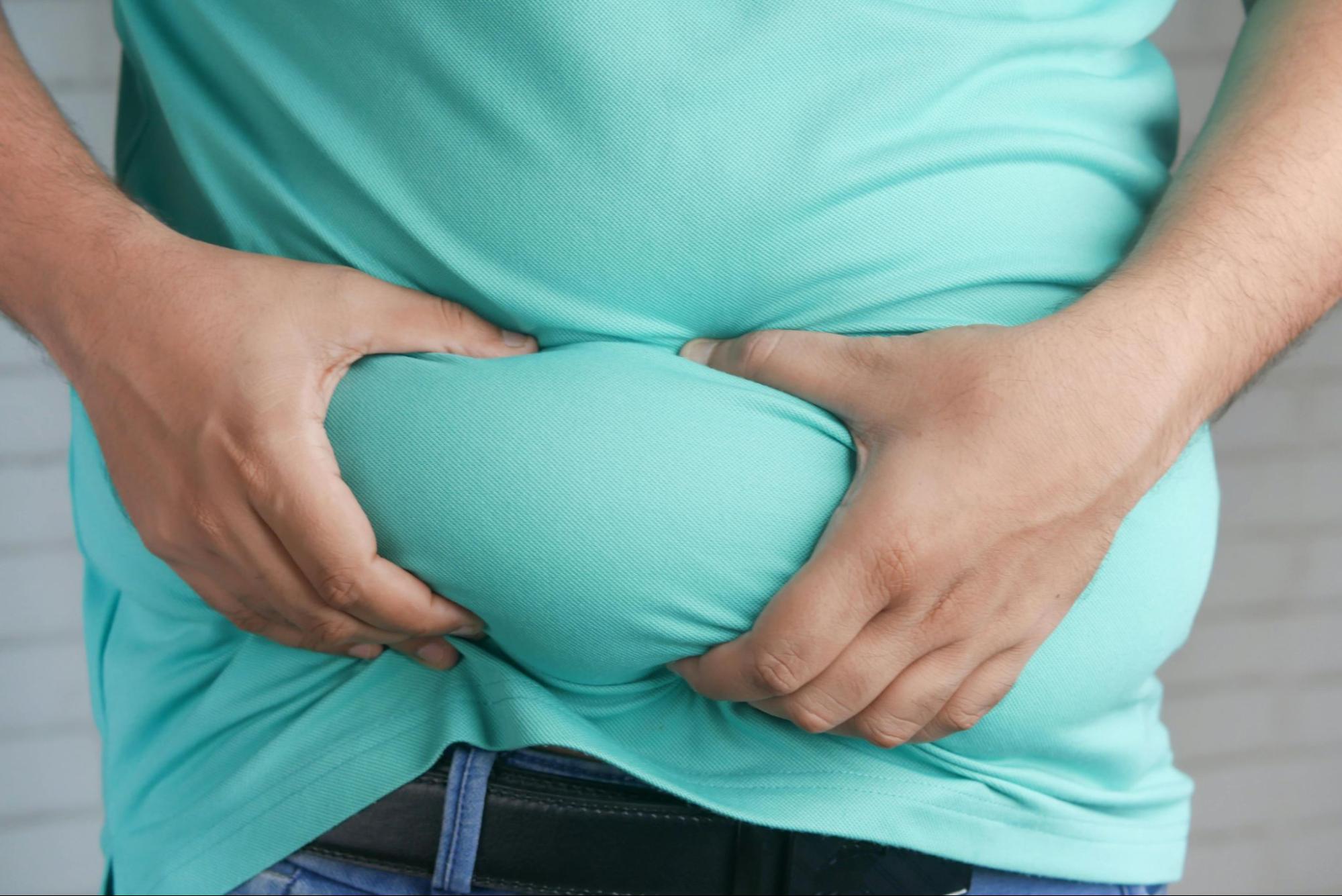 Person Grabbing Fat